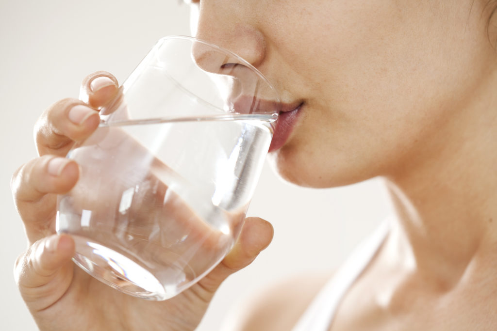 Young Woman Drinking Glass Of Water - Blog